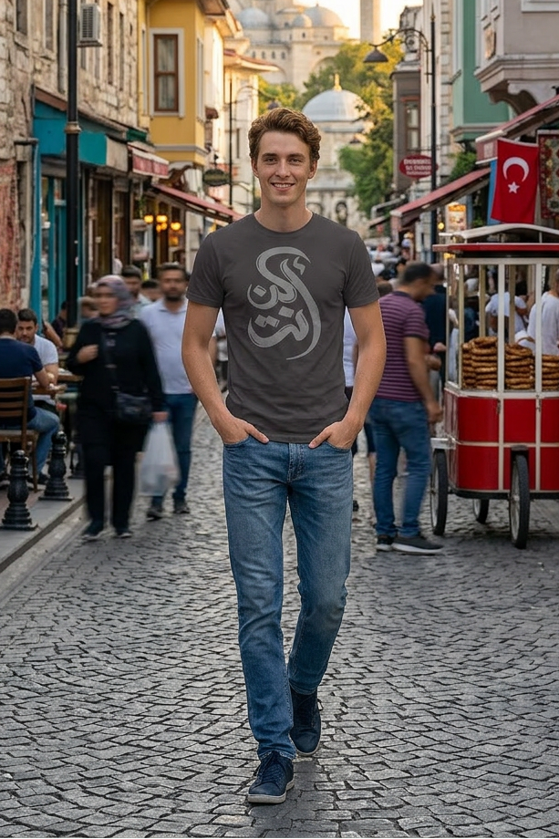 Man walking on a street in an urban area with buildings and people in the background