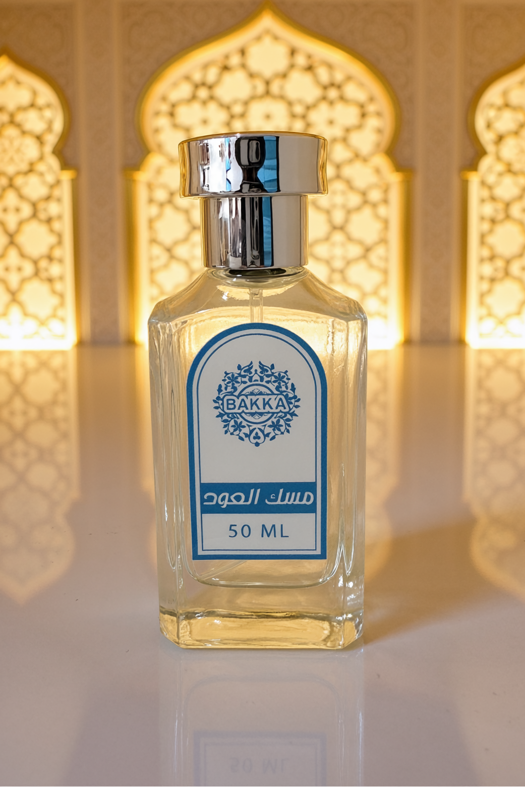 Bottle of Bakka perfume with a blue label against a decorative wall background
