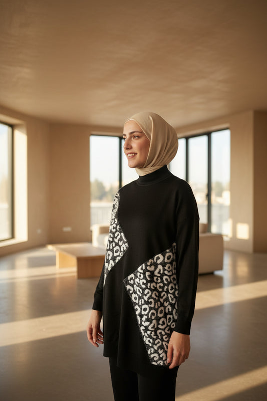 Person wearing a black outfit with white pattern in an outdoor setting